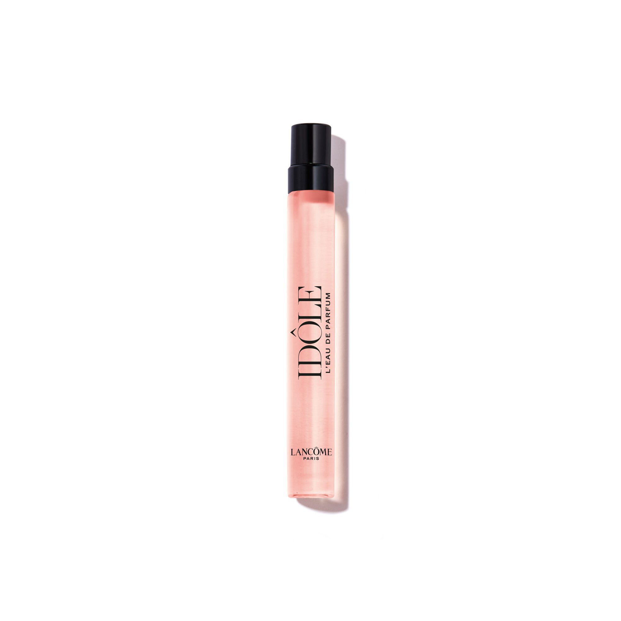 A slender travel-size spray bottle of Lancome Idole Eau de Parfum.