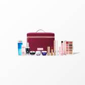 Lancome Holiday Beauty Box collection with skincare, makeup, and fragrance products arranged around a cherry-red vanity case.