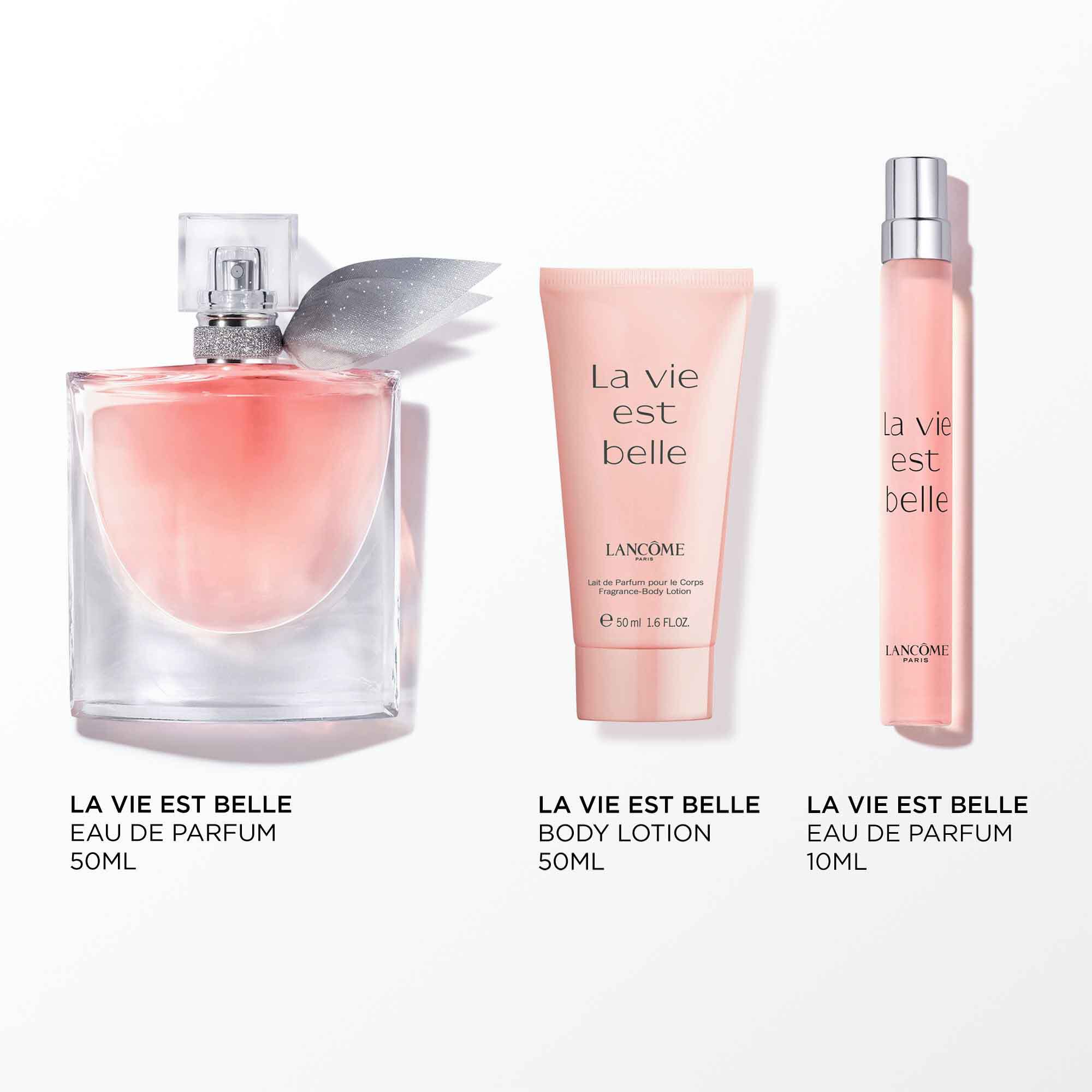 Image of the following products on a white background: LA VIE EST BELLE EDP 50ML - LA VIE EST BELLE EDP 10ML - LA VIE EST BELLE BODY LOTION 50ML